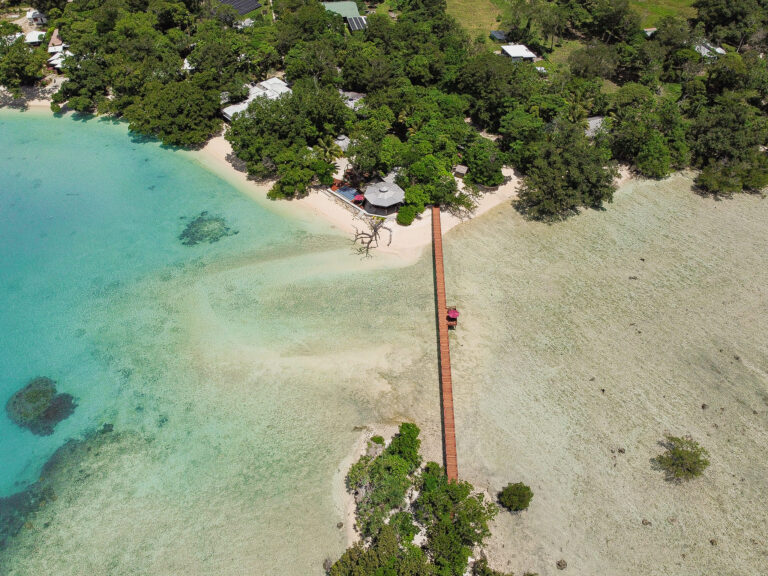 Exclusive Sunrise Resort Santo aerial view of entire beachfront property and jetty