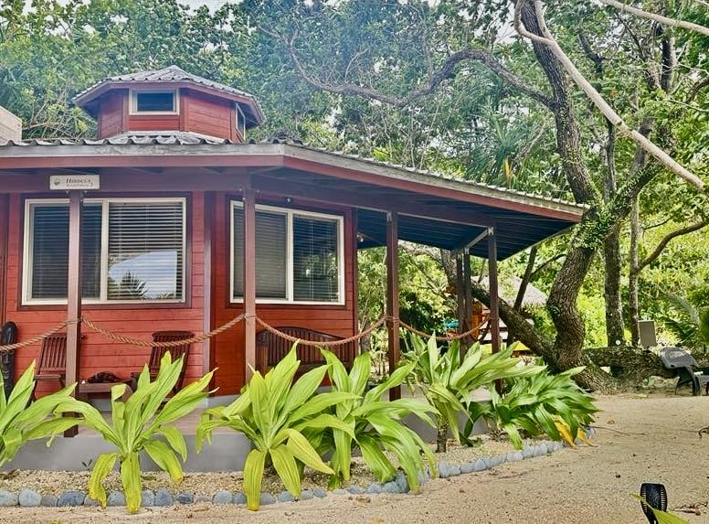 Hibiscus Seaside Villa surrounded by tropical gardens at Exclusive Sunrise Resort Santo