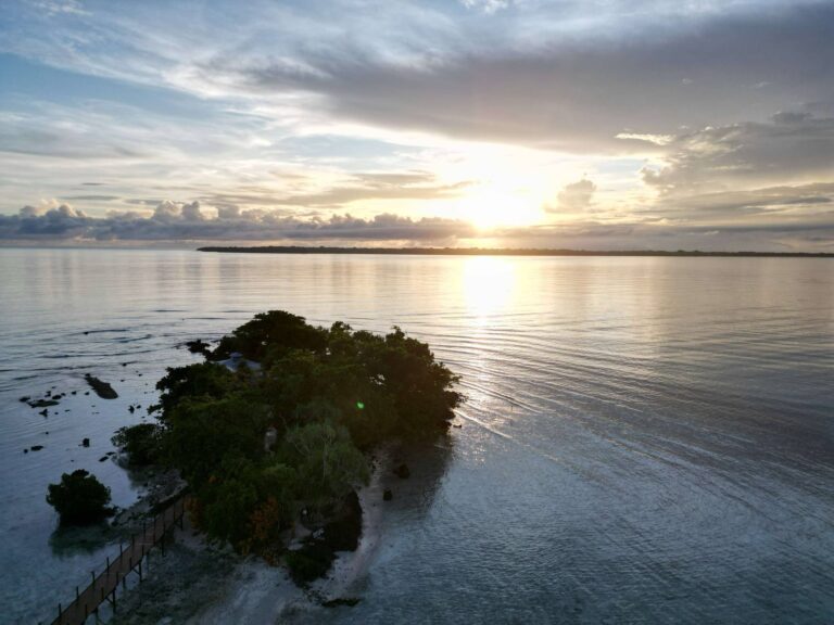 Maltinerava Private Island aerial view at sunrise at Exclusive Sunrise Resort Santo