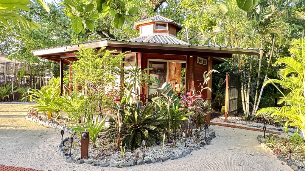 Tiara Ocean Serenity Villa with tropical landscaping at Exclusive Sunrise Resort Santo