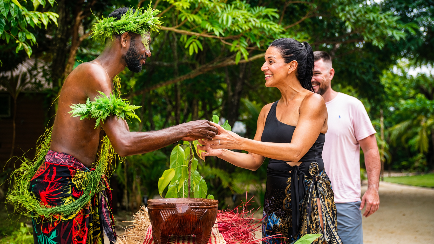 Guest taking part in a hosted traditional kava experience in Vanuatu