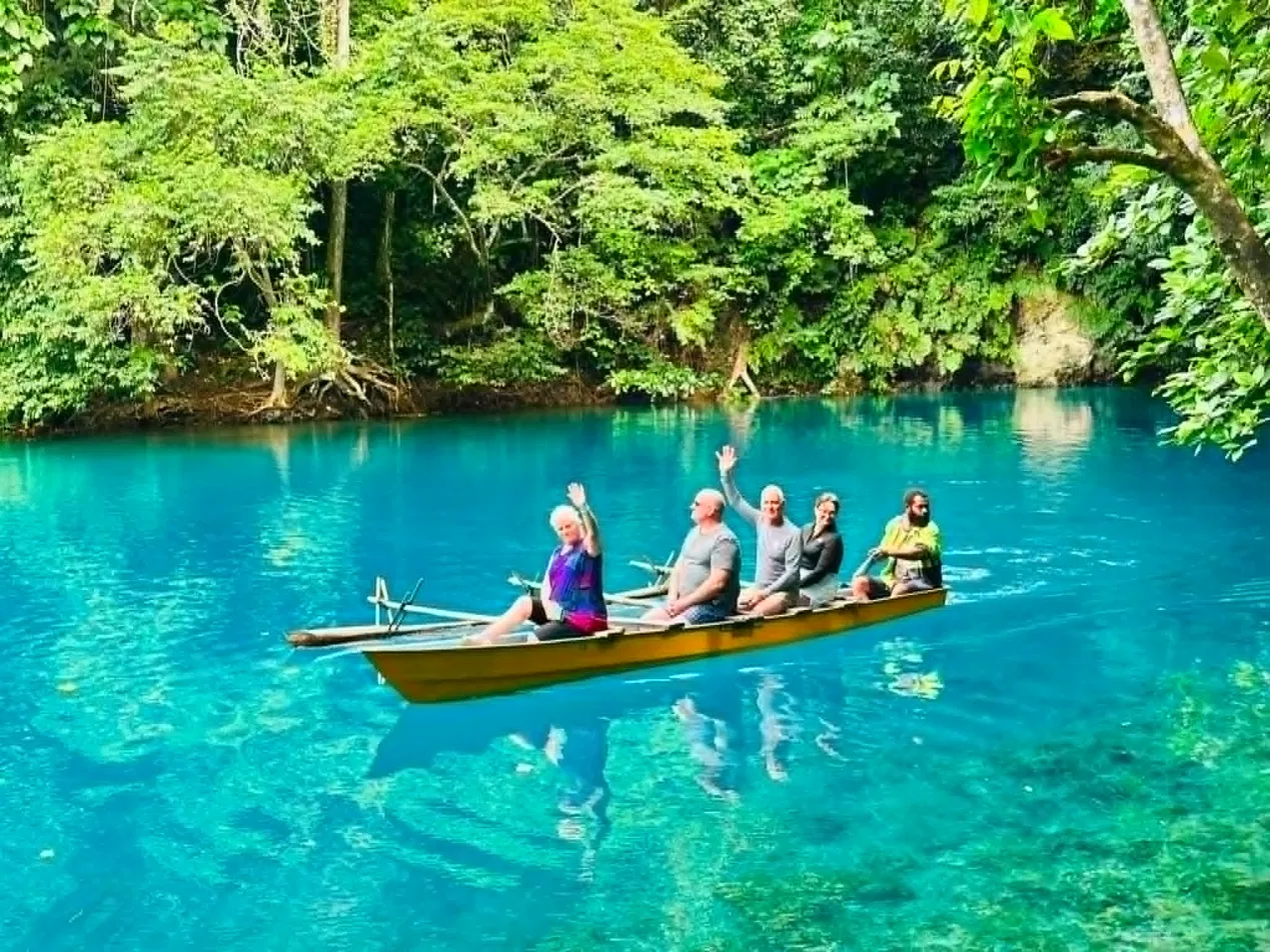 Guests enjoying a wider canoe journey along the Riri River