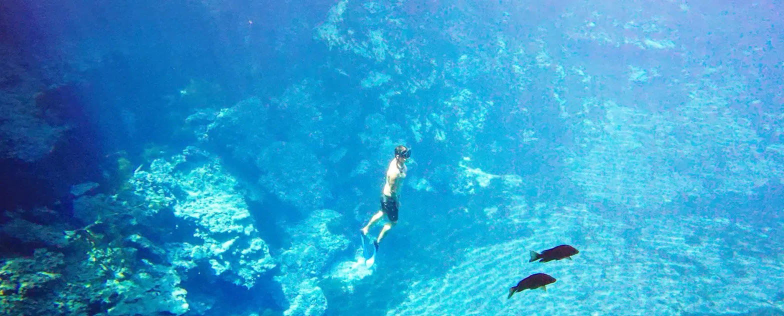 Swimming and snorkelling at a rainforest blue hole in Santo